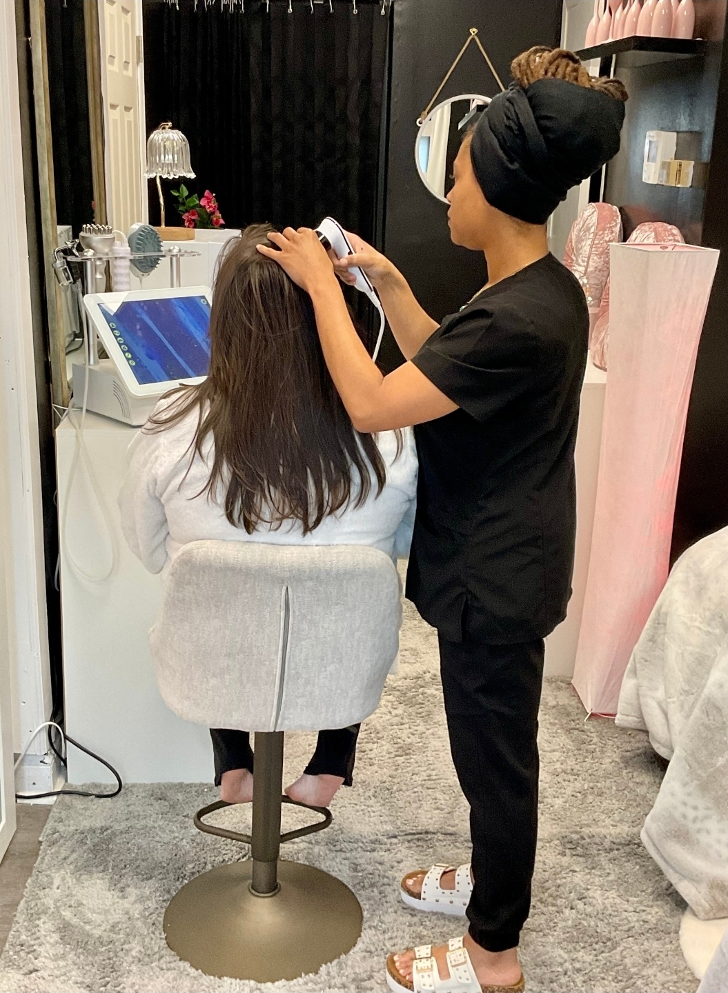 Hair & Skin Analysis — Stylist using handheld scalp scanner on seated client